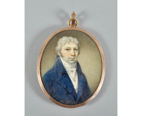 English school circa 1800 - an oval portrait miniature of a gentleman named Mr Oswald, he wearing a blue coat with white wais