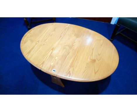 An Ercol Windsor gateleg coffee table. 104cm extended