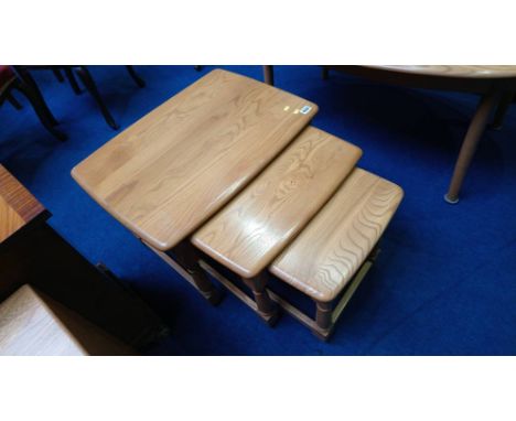 An Ercol nest of three tables