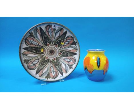 A Poole vase and a Denby charger