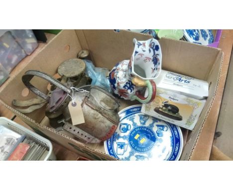 A box containing scales and lamp etc.