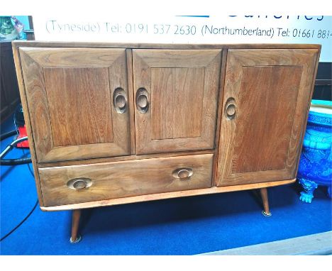 An Ercol Windsor sideboard. 113cm wide