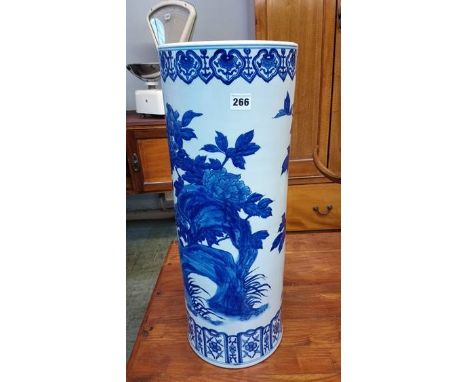 A large blue and white stick stand