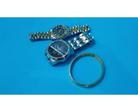 A gents Tissot automatic, a bangle and another watch