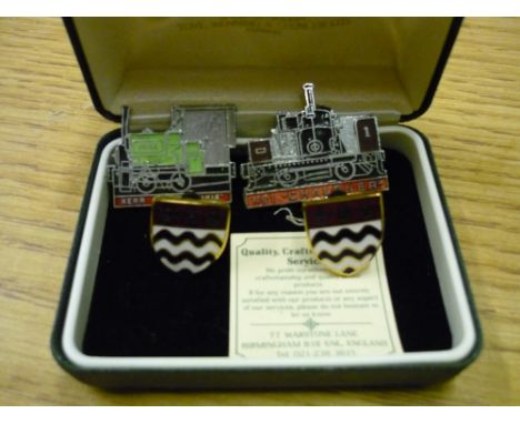 Cased pair of enamel crested cuff-links and two railway related lapel badges 