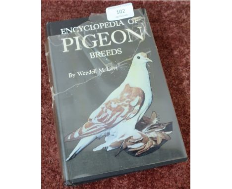 The Encyclopedia of Pigeon Breeds by Wendell M. Levi, published by T.F.H Publications 