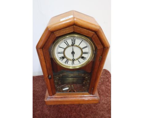 Late 19th C/early 20th C American mantle clock in stained beech case, two train movement striking on a bell with faux mercury