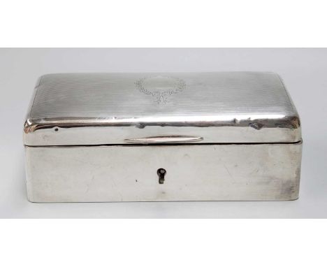 A George V Silver Jewellery-Box, by Charles S. Green and Co. Ltd., Birmingham, 1927, oblong, the hinged cover with engine-tur