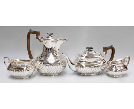 A Four-Piece Victorian Silver Tea-Service, by Joseph Rodgers and Sons, Sheffield, 1896, each piece tapering and with spiral-f