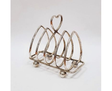 George V silver toast rack, heart-pattern with four sections, on ball feet, Birmingham 1930, 3ozt approx.&nbsp;Condition Repo