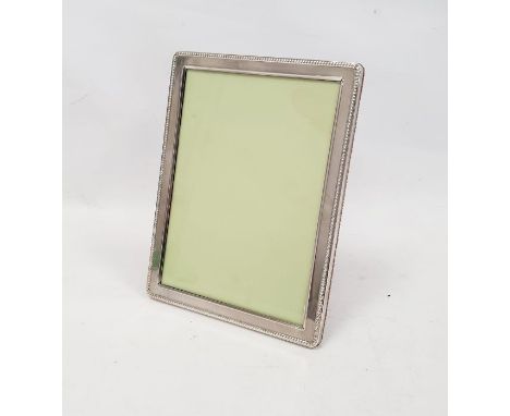 Mappin &amp; Webb rectangular silver-mounted photograph frame with beaded edge, Sheffield 2003, 15.2cm x 20.4cm approx.&nbsp;