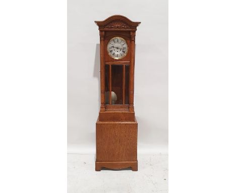 Mid 20th century grandmother clock with Westminter chime in light oak case, the dished dial with roman numerals and brass bez