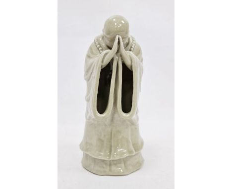 Chinese ceramic figure&nbsp;of monk in prayer with faint mark to base, 24cm high&nbsp;
