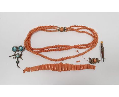 Silver dagger brooch&nbsp;set with agate, a silver-coloured and turquoise, white enamel brooch, a coral three-strand graduati