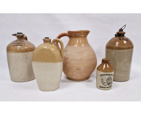 Stoneware bottles and jugs to include one marked 'T H Witchell Brewer & Spirit Merchant, Tetbury', another stoneware bottle o