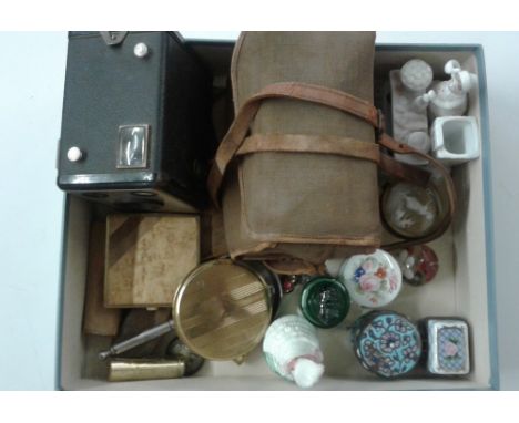 A tray containing two Kodak cameras; a Fairings ornament; a compact; a small enamel pot and cover etc.