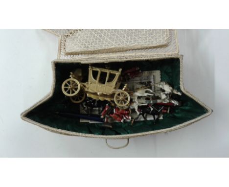 A Johillco model carriage with figures
