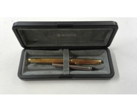 A gold plated Parker fountain pen with 14ct gold nib
