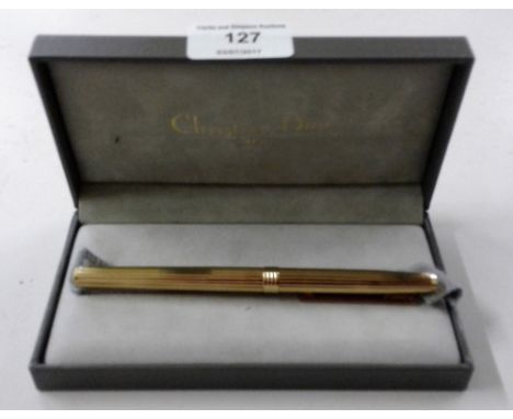 A Christian Dior gold plated fountain pen with 14ct nib