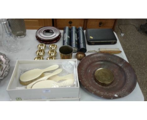 A dressing table set; together with an Art Nouveau style copper plaque; boxed cutlery; a hard wood stand etc. 