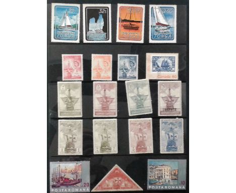 A box containing five albums of first day covers and one containing stamps.