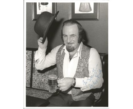 Acker Bilk signed 10x8 b/w photo. English clarinettist and vocalist known for his appearance - goatee, bowler hat and striped