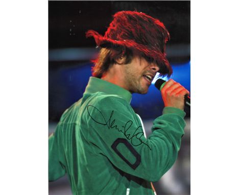 Jamiroquai signed 16x12 colour photo. British funk and jazz band from London, formed in 1992. Fronted by singer-songwriter Ja