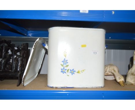 An enamel bread bin with floral decoration