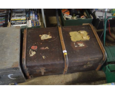 A wooden bound travelling trunk