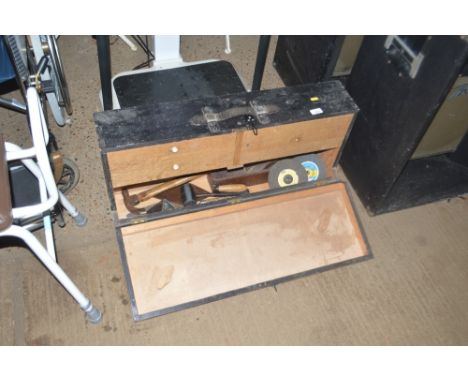 A carpenters tool chest; and contents