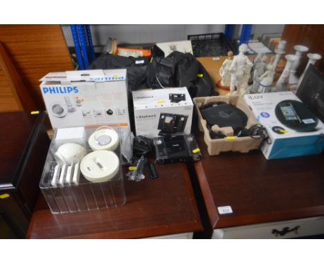 A Iluv stereo speaker dock together with an iStation 3 and a Philips dock