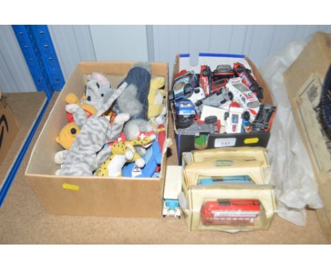 A collection of various diecast model vehicles and soft toys