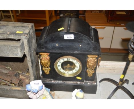 A black slate mantle clock AF