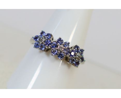A lady's white metal ring stamped 375 (9 ct) set with cz, size R, approx weight 2.59 gm (all in)
ALL ITEMS MUST BE PAID FOR A