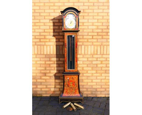 A contemporary Tempus Fugit longcase clock with faux Boulle Work case, pendulum and weights, approximately 204 cm (h). [W]
AL