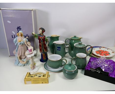 A mixed lot comprising a figure with musical movement by Sankyo depicting mother with flowing robes and baby, with cherub and