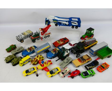 Matchbox - Corgi - A mixed lot of over 20 unboxed diecast vehicles in varying scales to include K-10 Car Transporter, 320 Jag