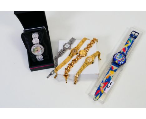 A lady's fashion wristwatch by Seksy, cased with ephemera, and five further wristwatches to include Swatch 
ALL ITEMS MUST BE