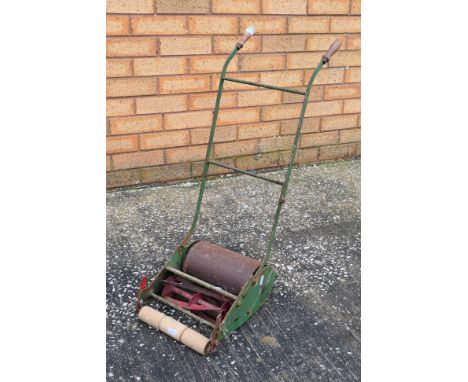 A children's vintage push along lawn mower by Webb. [W]
ALL ITEMS MUST BE PAID FOR AND COLLECTED/SHIPPED BY CLOSE OF BUSINESS
