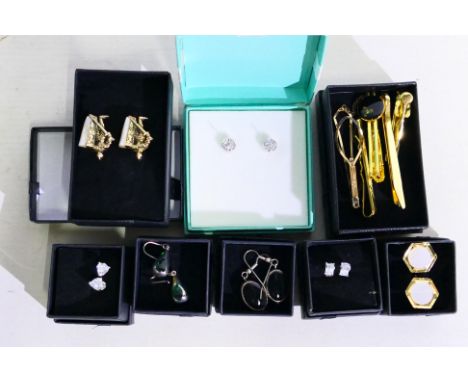 Five pairs of silver earrings, various designs to include two pairs of drop earrings, cufflinks and tie pins, all boxed. [B]
