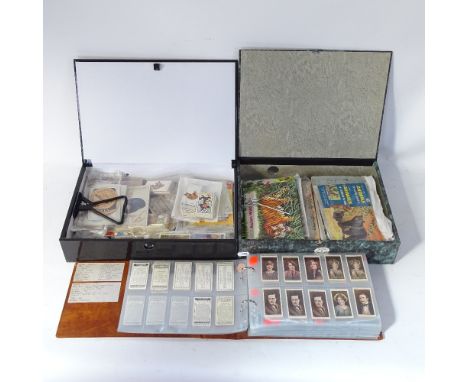 A collection of various Vintage cigarette cards, including Wills and Player's 