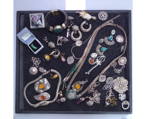 A tray of mainly silver costume jewellery, to include and onyx and stone set bangle, a snake design metal choker, a dolphin d