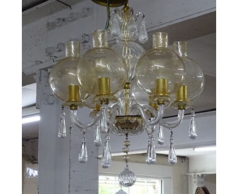 A Murano glass 6-branch chandelier with tear-shape drops and speckled gilded bowl shades 