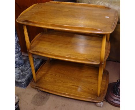 An Ercol 3-tier tea trolley on turned supports, W71cm 