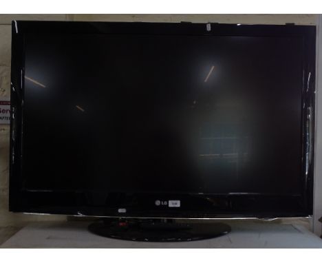 An LG 40" flat screen television with remote, GWO 