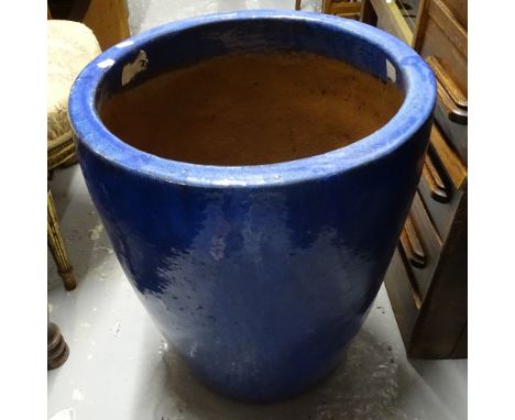 A blue glazed ceramic garden planter, H56cm 