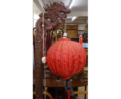 A Chinese relief carved standard lamp in the form of a dragon, with needlework decorated balloon shade, H180cm 