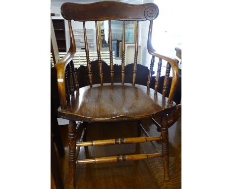 An Antique American stick-back armchair 