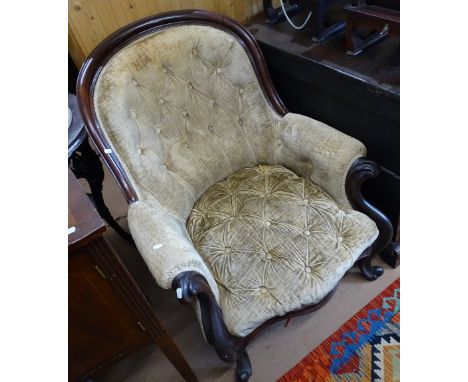 A Victorian mahogany-framed and button-back upholstered armchair 