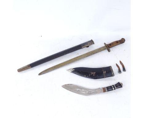 A First War Period military issue bayonet and scabbard, and an Indian kukri knife and scabbard (2) 